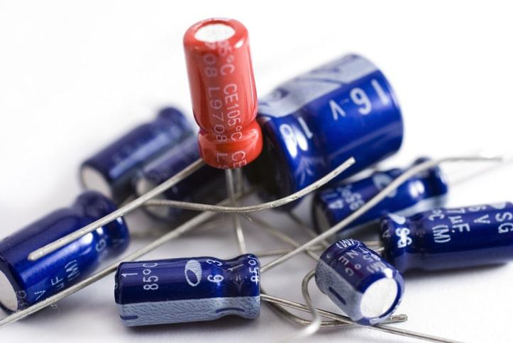 Collection of capacitors against a white background
